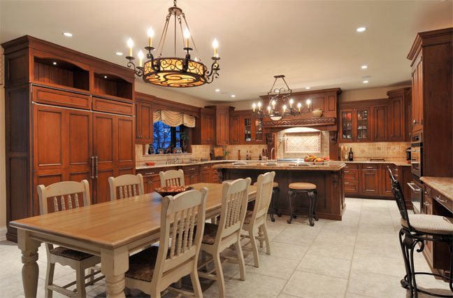 Old World Wood-Mode Kitchen with Large Cooking Hearth by Mario Mulea