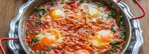 Shakshuka Eggs Cooked in a kitchen designed by Ken Kelly Kitchens on Long Island, NY