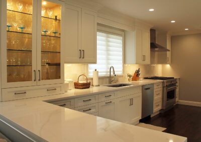 White Kitchen Cabinet - Glass Cabinet Insert - Bosch 800 Series 24 in. Stainless Steel Dishwasher - Monogram Professional Series 36 Inch Smart Range - Kitchen Backlit