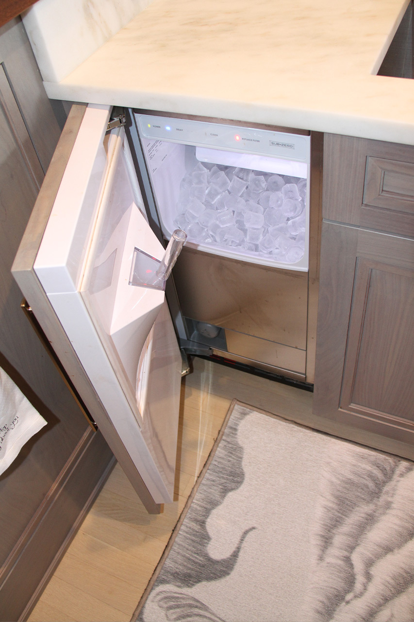 Wet Bar Cabinet - Opened integrated Ice Maker panel