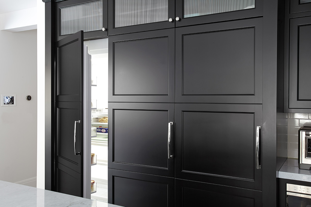 Black Kitchen Cabinet - Opened integrated fridge panel