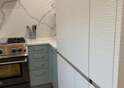 Teal Kitchen Cabinet, Integrated fridge, White Full Slab kitchen backsplash