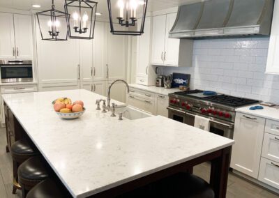 Stainless Steel Range Hood, Stainless Steel Wolf Range, White Kitchen Backsplash Tiles, White Kitchen Countertop Island