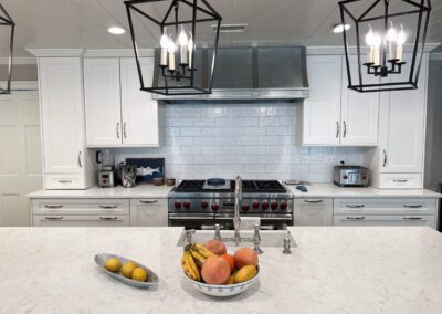 White Kitchen Stainless Steel Range Hood, Stainless Wolf Range, Kitchen Front view, Decorative Lights, White Kitchen Backsplash Tiles