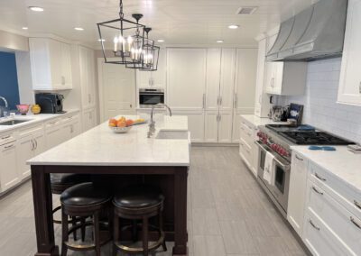 Stainless Steel Range Hood, Stainless Steel Wolf Range, White Kitchen Backsplash Tiles, White Kitchen Countertop Island