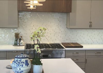 Lakefront Kitchen with Golf course Views. SubZero wine refrigeration and built in spice drawer pull outs.