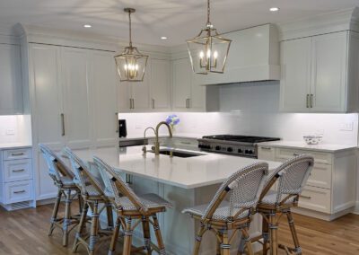 New custom white kitchen cabinetry wood floor